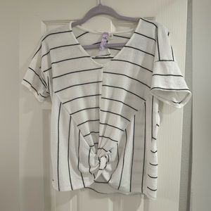 Francesca’s black and white striped blouse